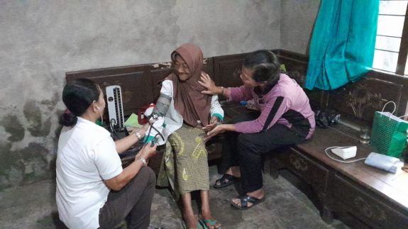 Home Visit by Health Cadres to an Elderly Resident