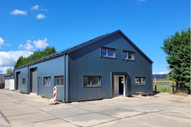 Prefab garage laten bouwen - Snelbouwloods