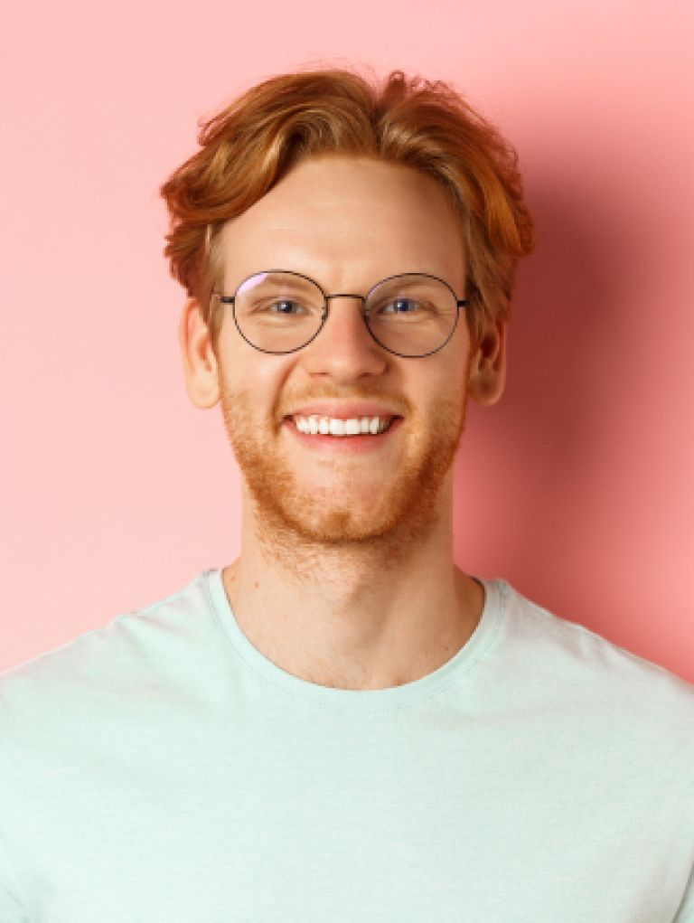 close-up-happy-redhead-man-face-smiling-with-white-teeth-camera-wearing-glasses-better-sig 1 Blonde man