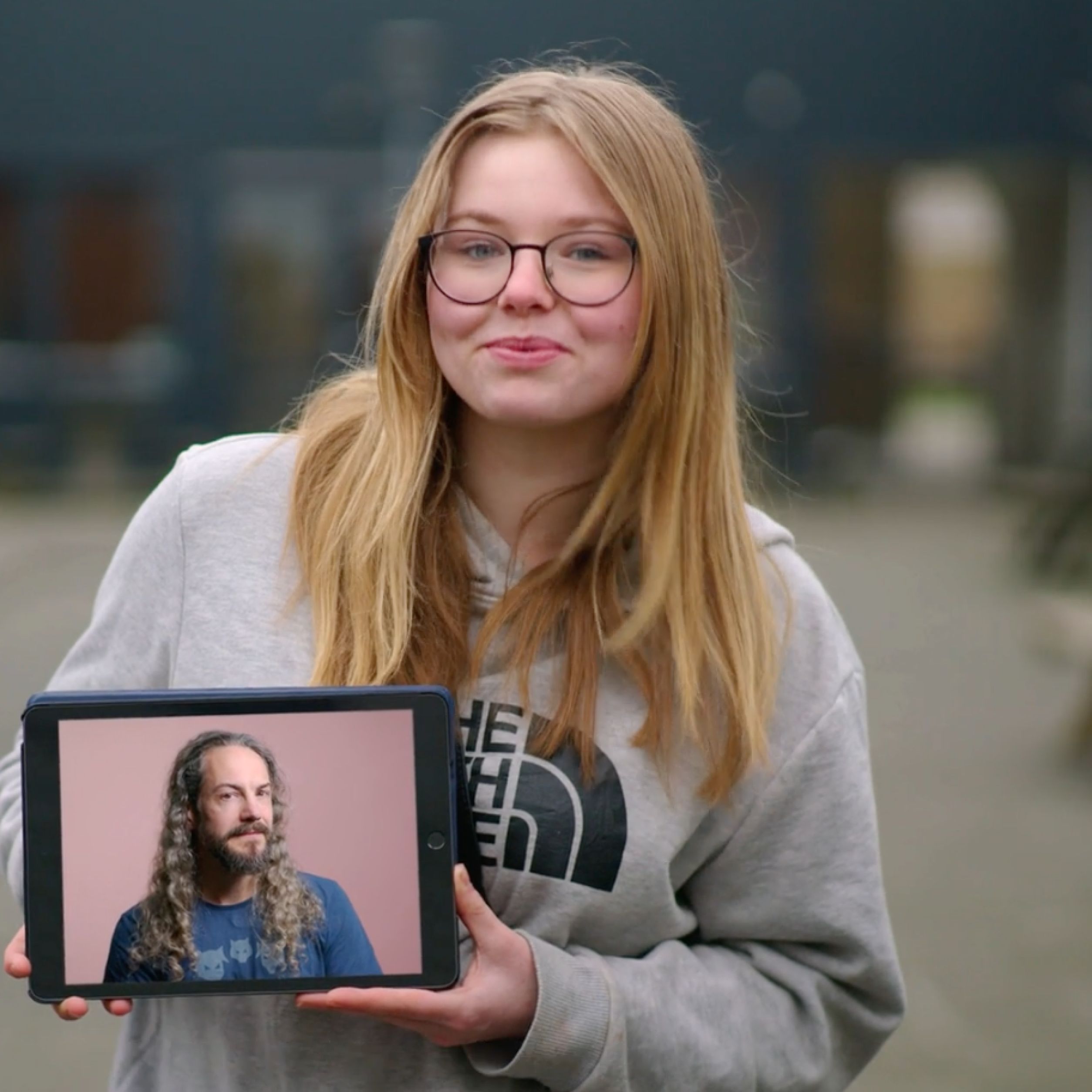 Foto van leerling met iPad