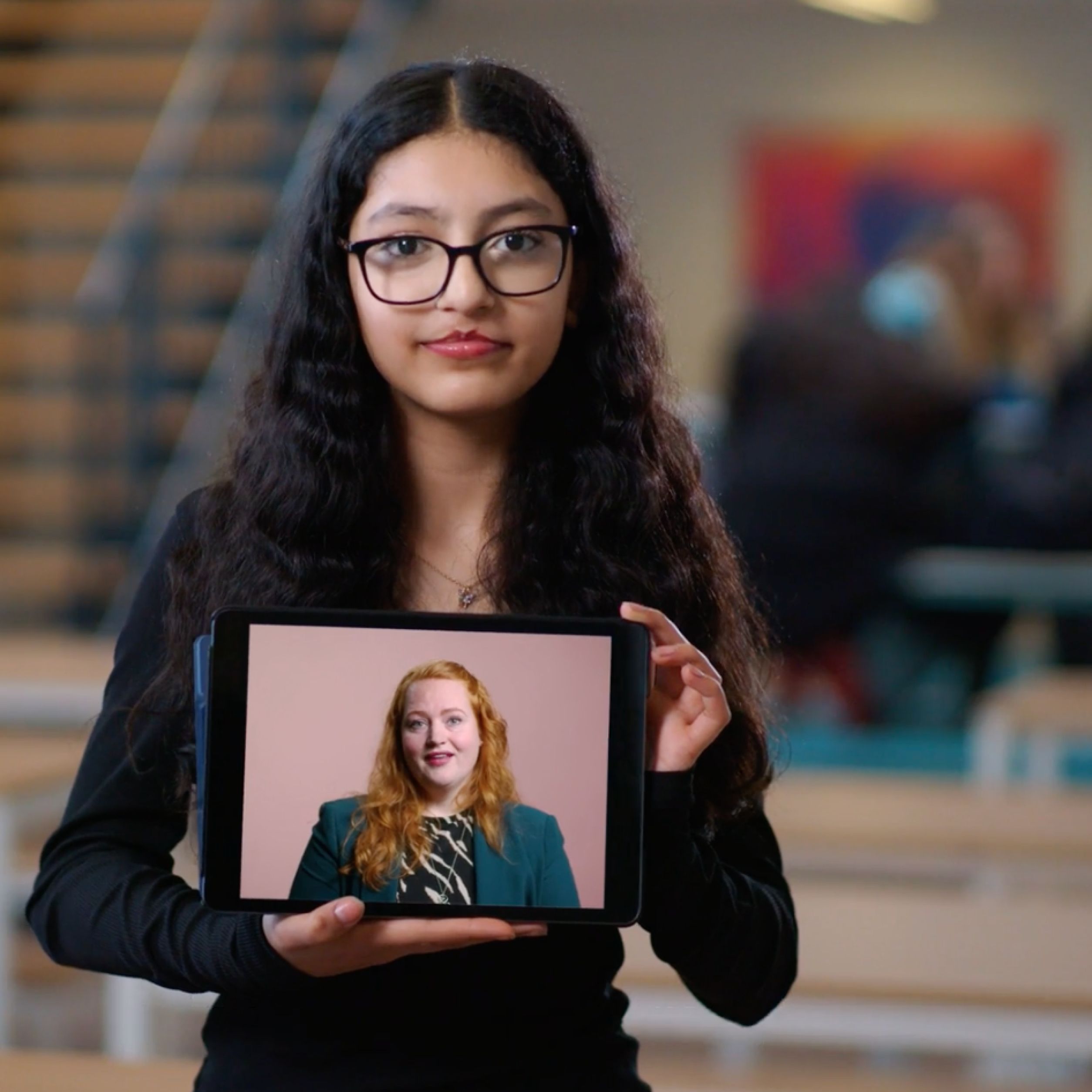Foto van leerling met iPad
