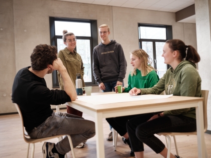 Studenten in het opleidingshuis
