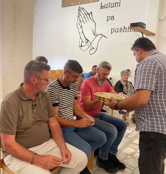 Avondmaal in kerk Lac-website