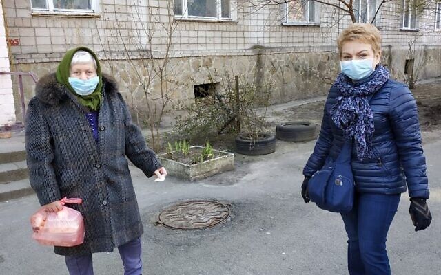 alina with food parcel and old woman 0x00
