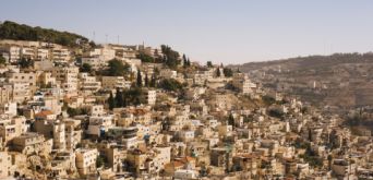 beige-concrete-buildings-on-high-ground-2087392