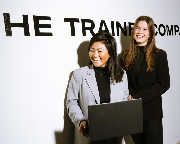 Young professionals met laptop Young professionals met laptop